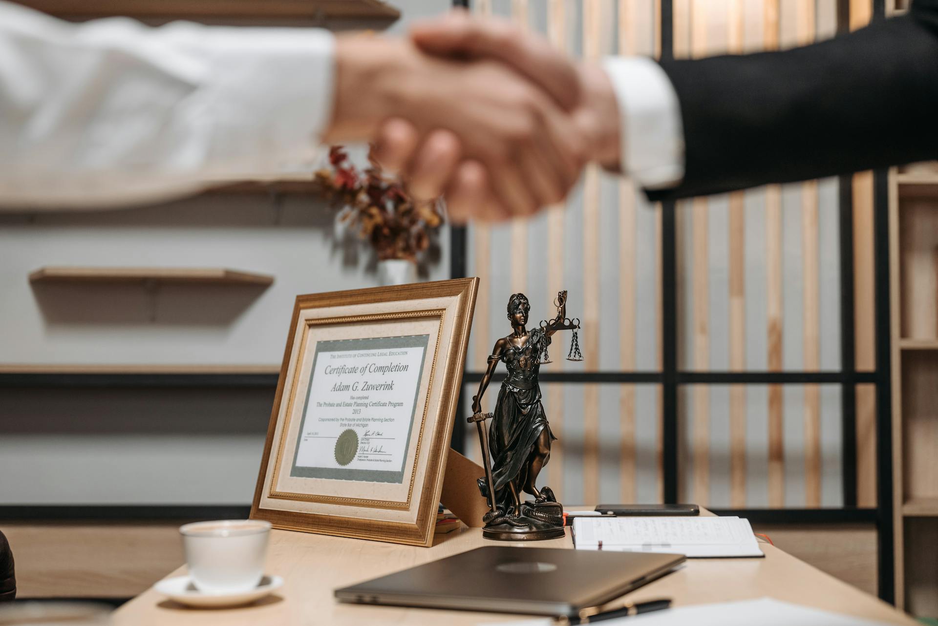 A lawyer agreeing to hourly rates with a client